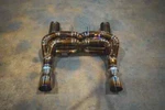 Valvetronic Designs Double Pipe F1 Race Exhaust Kit For 2018-2022 Mclaren 720S. Fixed Price $4999.00.