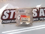 Nos Honda 14411-HM8-000 Holder, Rocker Arm Recon TRX250. Fixed Price $50.00.