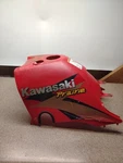 2000 Kawasaki Prairie 400 4X4 Oem Fuel Tank Cover Red 14090-1666-6L AK16. Fixed Price $49.99.